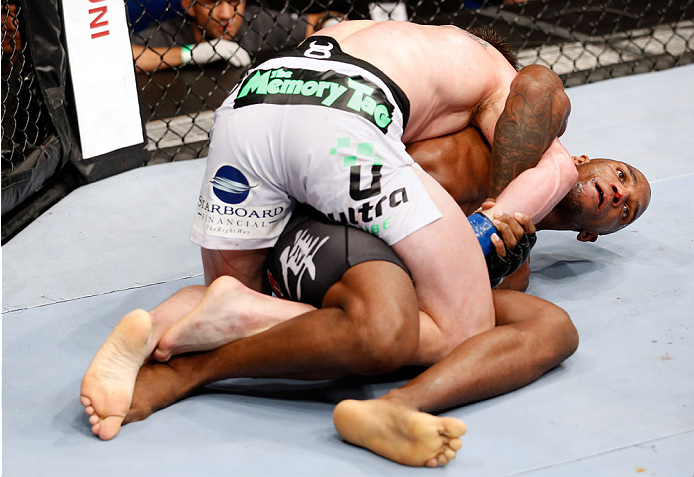 BERLIN, GERMANY - MAY 31: C.B. Dollaway (L) fights Francis Carmont during the C.B. Dollaway vs. Francis Carmont match at UFC Fight Night Berlin event at O2 World on May 31, 2014 in Berlin, Germany. (Photo by Boris Streubel/Zuffa LLC/Zuffa LLC via Getty I