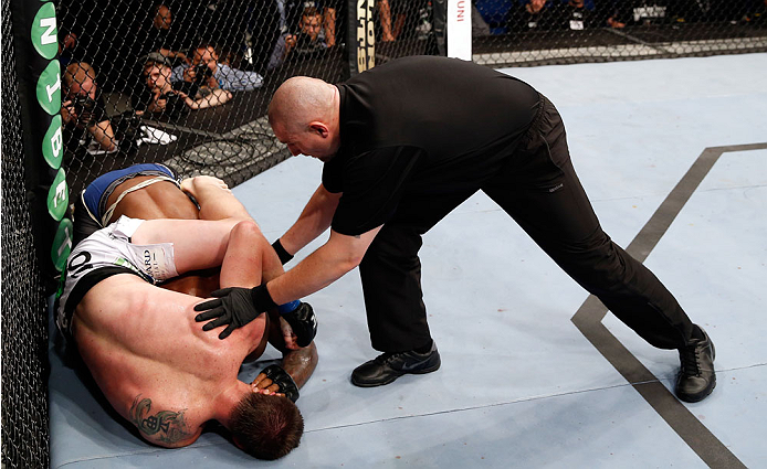 BERLIN, GERMANY - MAY 31: C.B. Dollaway (Bottom) fights Francis Carmont (C) during the C.B. Dollaway vs. Francis Carmont match at UFC Fight Night Berlin event at O2 World on May 31, 2014 in Berlin, Germany. (Photo by Boris Streubel/Zuffa LLC/Zuffa LLC vi