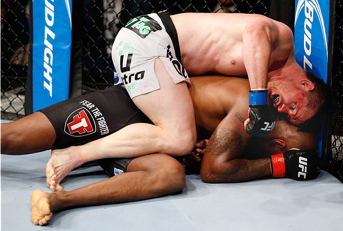 BERLIN, GERMANY - MAY 31: C.B. Dollaway (L) fights Francis Carmont during the C.B. Dollaway vs. Francis Carmont match at UFC Fight Night Berlin event at O2 World on May 31, 2014 in Berlin, Germany. (Photo by Boris Streubel/Zuffa LLC/Zuffa LLC via Getty I