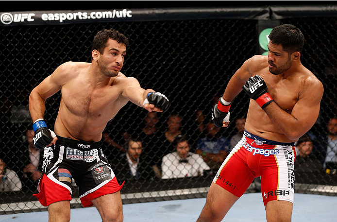 BERLIN, GERMANY - MAY 31: Gegard Mousasi (L) fights Mark Munoz during the Gegard Mousasi vs. Mark Munoz match at UFC Fight Night Berlin event at O2 World on May 31, 2014 in Berlin, Germany. (Photo by Boris Streubel/Zuffa LLC/Zuffa LLC via Getty Images)