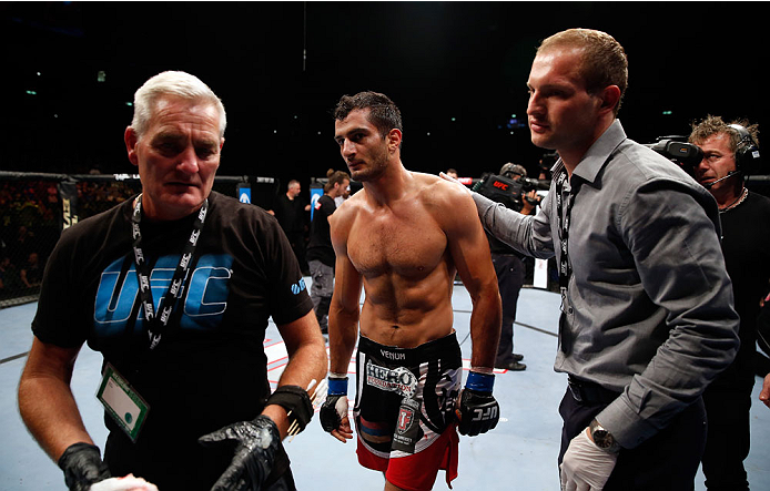 BERLIN, GERMANY - MAY 31: Gegard Mousasi (C) leaves the octagon after winning the Gegard Mousasi vs. Mark Munoz match at UFC Fight Night Berlin event at O2 World on May 31, 2014 in Berlin, Germany. (Photo by Boris Streubel/Zuffa LLC/Zuffa LLC via Getty I