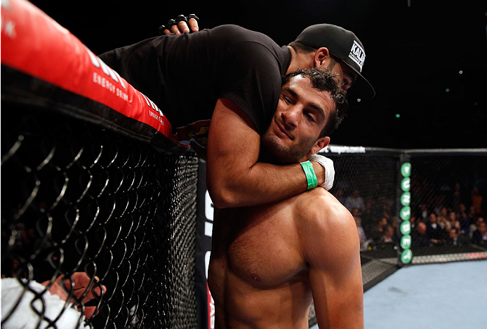BERLIN, GERMANY - MAY 31: Gegard Mousasi (R) celebrates after winning the Gegard Mousasi vs. Mark Munoz match at UFC Fight Night Berlin event at O2 World on May 31, 2014 in Berlin, Germany. (Photo by Boris Streubel/Zuffa LLC/Zuffa LLC via Getty Images)