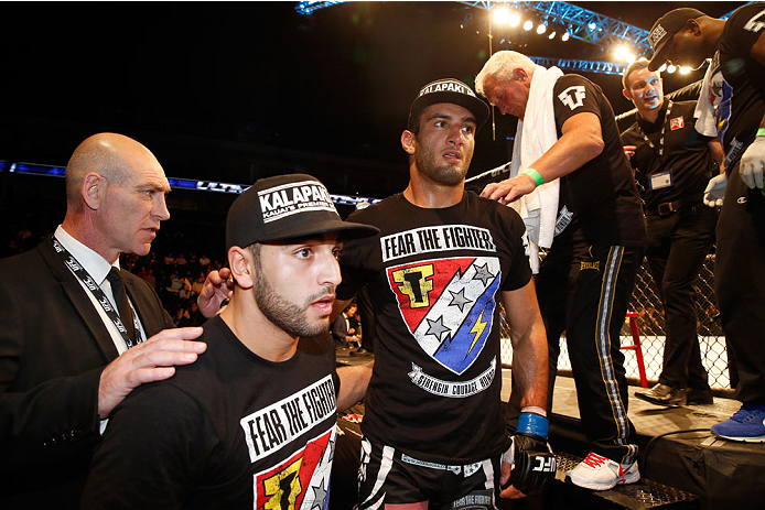 BERLIN, GERMANY - MAY 31: Gegard Mousasi (C) leaves the octagon after winning the Gegard Mousasi vs. Mark Munoz match at UFC Fight Night Berlin event at O2 World on May 31, 2014 in Berlin, Germany. (Photo by Boris Streubel/Zuffa LLC/Zuffa LLC via Getty I