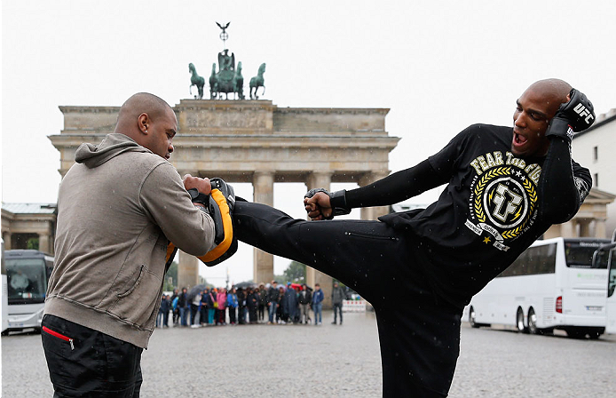 BERLIN, GERMANY - MAY 28: Francis Carmont (R) holds a Guerillia open air training session for fans and media at Brandenburg Gate on May 28, 2014 in Berlin, Germany. (Photo by Boris Streubel/Zuffa LLC/Zuffa LLC via Getty Images)
