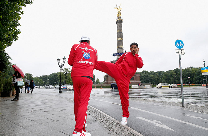BERLIN, GERMANY - MAY 28: Mark Munoz (R) holds a Guerillia open air training session for fans and media at Victoria Statue on May 28, 2014 in Berlin, Germany. (Photo by Boris Streubel/Zuffa LLC/Zuffa LLC via Getty Images)