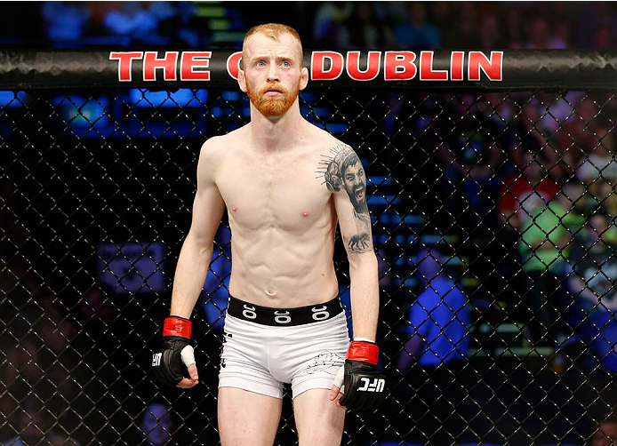 DUBLIN, IRELAND - JULY 19: Patrick Holohan stands in the Octagon before his flyweight bout against Josh Sampo during the UFC Fight Night event at The O2 Dublin on July 19, 2014 in Dublin, Ireland. (Photo by Josh Hedges/Zuffa LLC/Zuffa LLC via Getty Imag