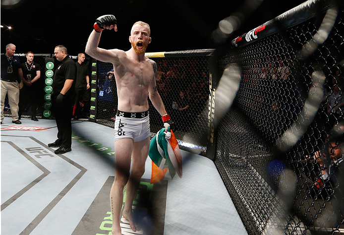 DUBLIN, IRELAND - JULY 19: Patrick Holohan celebrates after his submission victory over Josh Sampo in their flyweight bout during the UFC Fight Night event at The O2 Dublin on July 19, 2014 in Dublin, Ireland. (Photo by Josh Hedges/Zuffa LLC/Zuffa LLC v