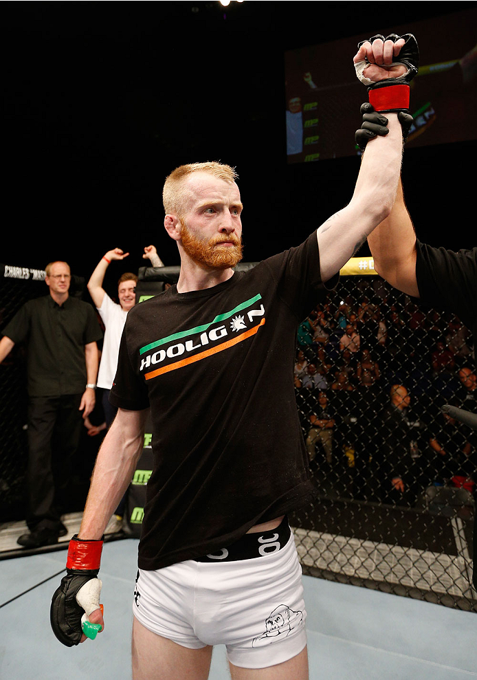 DUBLIN, IRELAND - JULY 19: Patrick Holohan celebrates after his submission victory over Josh Sampo in their flyweight bout during the UFC Fight Night event at The O2 Dublin on July 19, 2014 in Dublin, Ireland. (Photo by Josh Hedges/Zuffa LLC/Zuffa LLC v