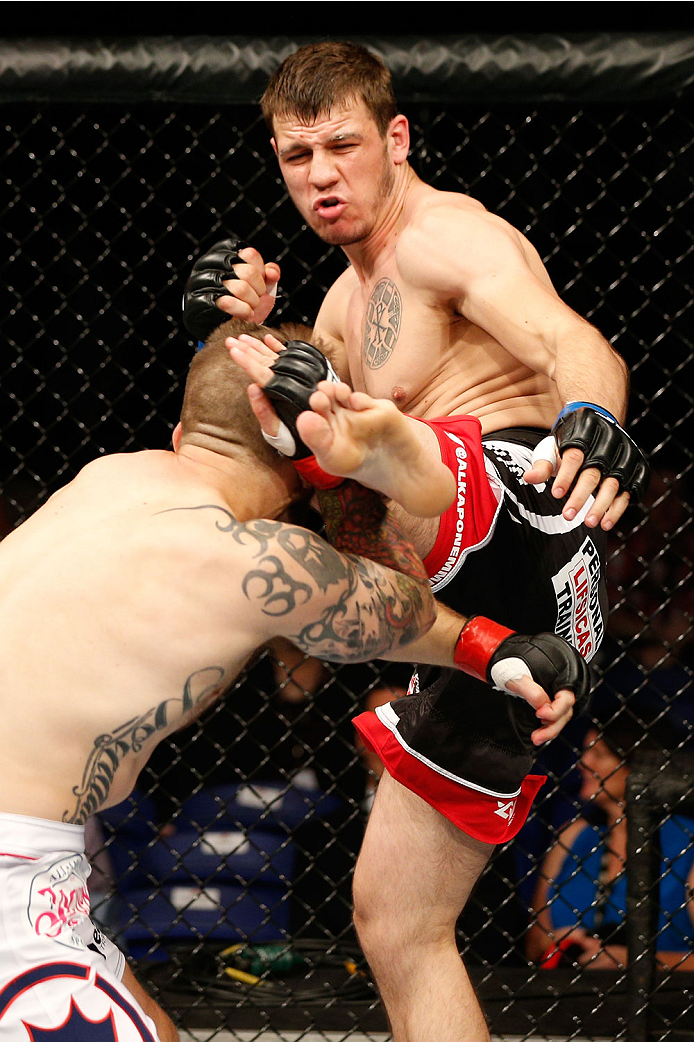 DUBLIN, IRELAND - JULY 19: (R-L) Nikita Krylov kicks Cody Donovan in their light heavyweight bout during the UFC Fight Night event at The O2 Dublin on July 19, 2014 in Dublin, Ireland. (Photo by Josh Hedges/Zuffa LLC/Zuffa LLC via Getty Images)