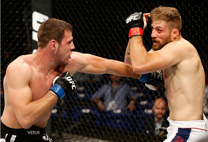 DUBLIN, IRELAND - JULY 19: (L-R) Nikita Krylov lands a left against Cody Donovan in their light heavyweight bout during the UFC Fight Night event at The O2 Dublin on July 19, 2014 in Dublin, Ireland. (Photo by Josh Hedges/Zuffa LLC/Zuffa LLC via Getty I