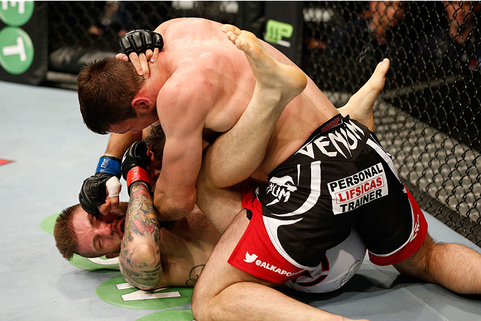 DUBLIN, IRELAND - JULY 19: Nikita Krylov (top) punches down at Cody Donovan in their light heavyweight bout during the UFC Fight Night event at The O2 Dublin on July 19, 2014 in Dublin, Ireland. (Photo by Josh Hedges/Zuffa LLC/Zuffa LLC via Getty Images