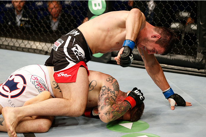DUBLIN, IRELAND - JULY 19: Nikita Krylov (top) punches down at Cody Donovan in their light heavyweight bout during the UFC Fight Night event at The O2 Dublin on July 19, 2014 in Dublin, Ireland. (Photo by Josh Hedges/Zuffa LLC/Zuffa LLC via Getty Images