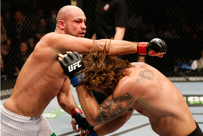 DUBLIN, IRELAND - JULY 19: (L-R) Cathal Pendred of Dublin punches Mike King in their middleweight bout during the UFC Fight Night event at The O2 Dublin on July 19, 2014 in Dublin, Ireland. (Photo by Josh Hedges/Zuffa LLC/Zuffa LLC via Getty Images)