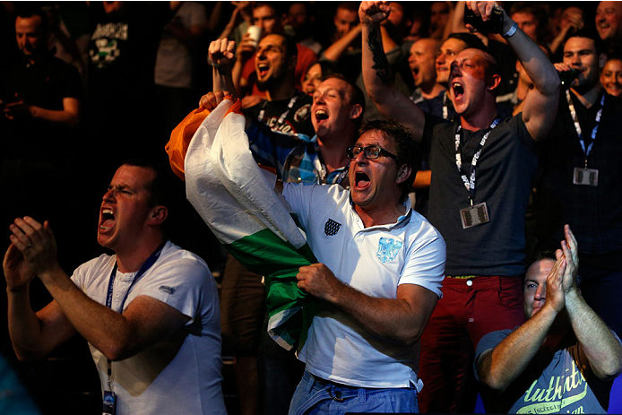 DUBLIN, IRELAND - JULY 19: A general view of fans cheering on Dublin's Cathal Pendred as he battles Mike King in a middleweight bout during the UFC Fight Night event at The O2 Dublin on July 19, 2014 in Dublin, Ireland. (Photo by Josh Hedges/Zuffa LLC/Z