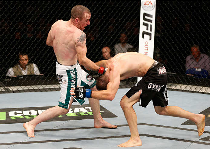 DUBLIN, IRELAND - JULY 19: (L-R) Neil Seery connects with an uppercut against Phil Harris in their flyweight bout during the UFC Fight Night event at The O2 Dublin on July 19, 2014 in Dublin, Ireland. (Photo by Josh Hedges/Zuffa LLC/Zuffa LLC via Getty