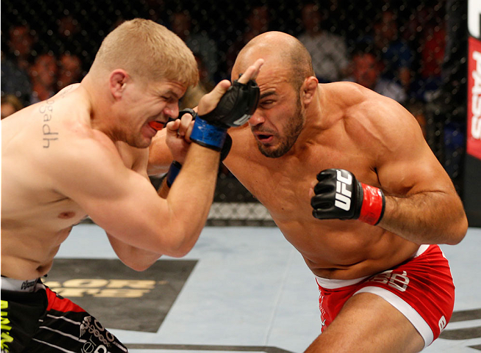 DUBLIN, IRELAND - JULY 19: (R-L) Ilir Latifi connects with a right to the head of Chris Dempsey in their light heavyweight bout during the UFC Fight Night event at The O2 Dublin on July 19, 2014 in Dublin, Ireland. (Photo by Josh Hedges/Zuffa LLC/Zuffa