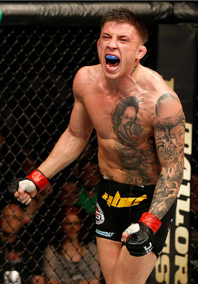 DUBLIN, IRELAND - JULY 19: Norman Parke celebrates after his TKO victory over Naoyuki Kotani in their lightweight bout during the UFC Fight Night event at The O2 Dublin on July 19, 2014 in Dublin, Ireland. (Photo by Josh Hedges/Zuffa LLC/Zuffa LLC via G