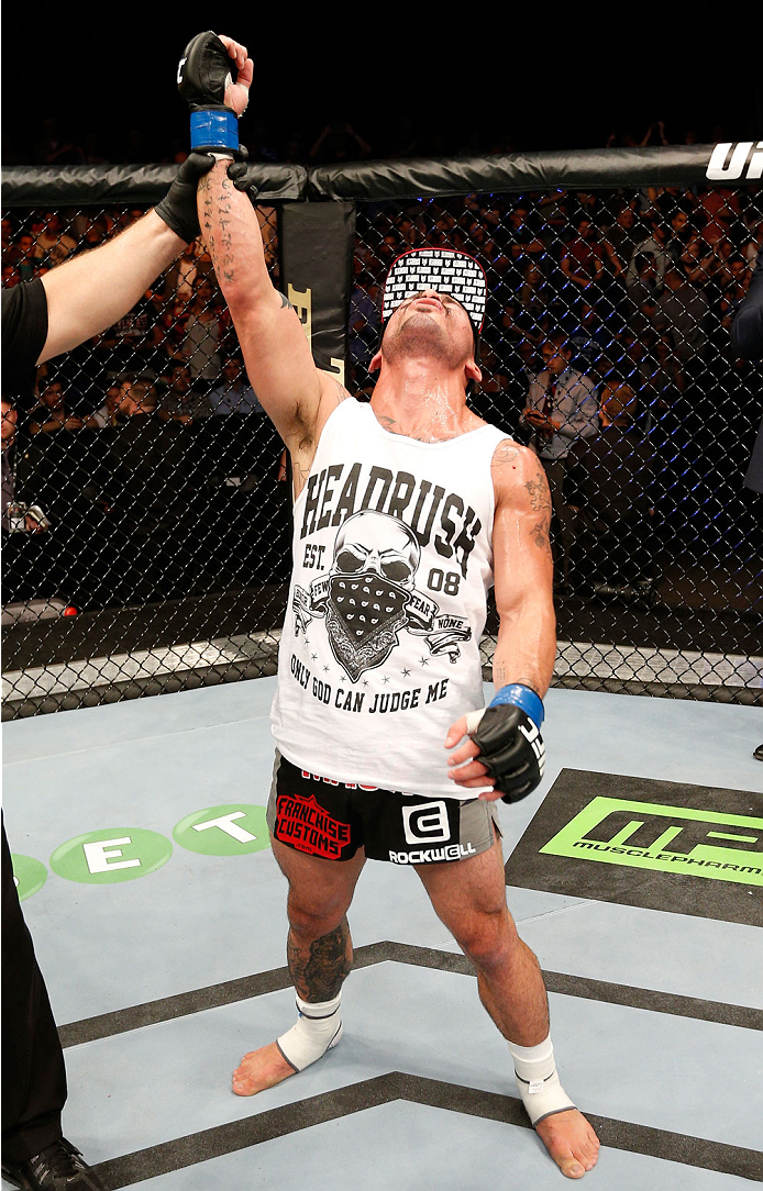 DUBLIN, IRELAND - JULY 19: Ian McCall celebrates after his unanimous-decision victory over Brad Pickett in their flyweight bout during the UFC Fight Night event at The O2 Dublin on July 19, 2014 in Dublin, Ireland. (Photo by Josh Hedges/Zuffa LLC/Zuffa
