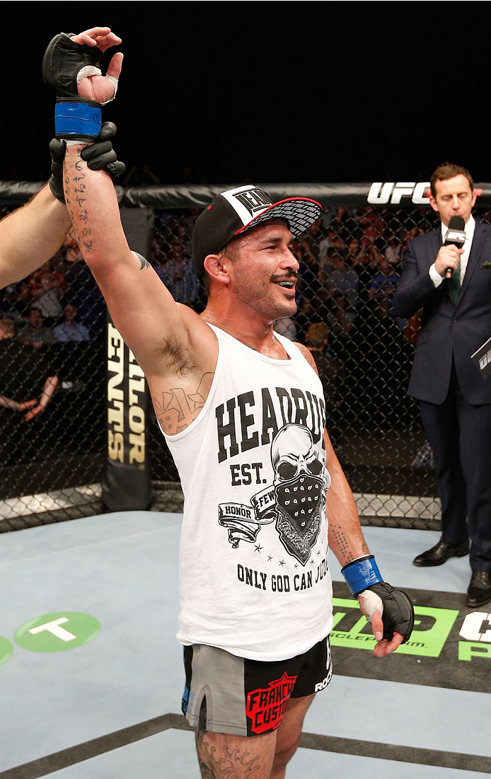 DUBLIN, IRELAND - JULY 19: Ian McCall celebrates after his unanimous-decision victory over Brad Pickett in their flyweight bout during the UFC Fight Night event at The O2 Dublin on July 19, 2014 in Dublin, Ireland. (Photo by Josh Hedges/Zuffa LLC/Zuffa