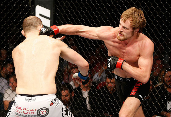 DUBLIN, IRELAND - JULY 19: (R-L) Gunnar Nelson connects with a right to the head of Zak Cummings in their welterweight bout during the UFC Fight Night event at The O2 Dublin on July 19, 2014 in Dublin, Ireland. (Photo by Josh Hedges/Zuffa LLC/Zuffa LLC