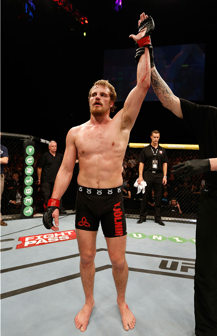 DUBLIN, IRELAND - JULY 19: Gunnar Nelson celebrates after his submission victory over Zak Cummings in their welterweight bout during the UFC Fight Night event at The O2 Dublin on July 19, 2014 in Dublin, Ireland. (Photo by Josh Hedges/Zuffa LLC/Zuffa LL