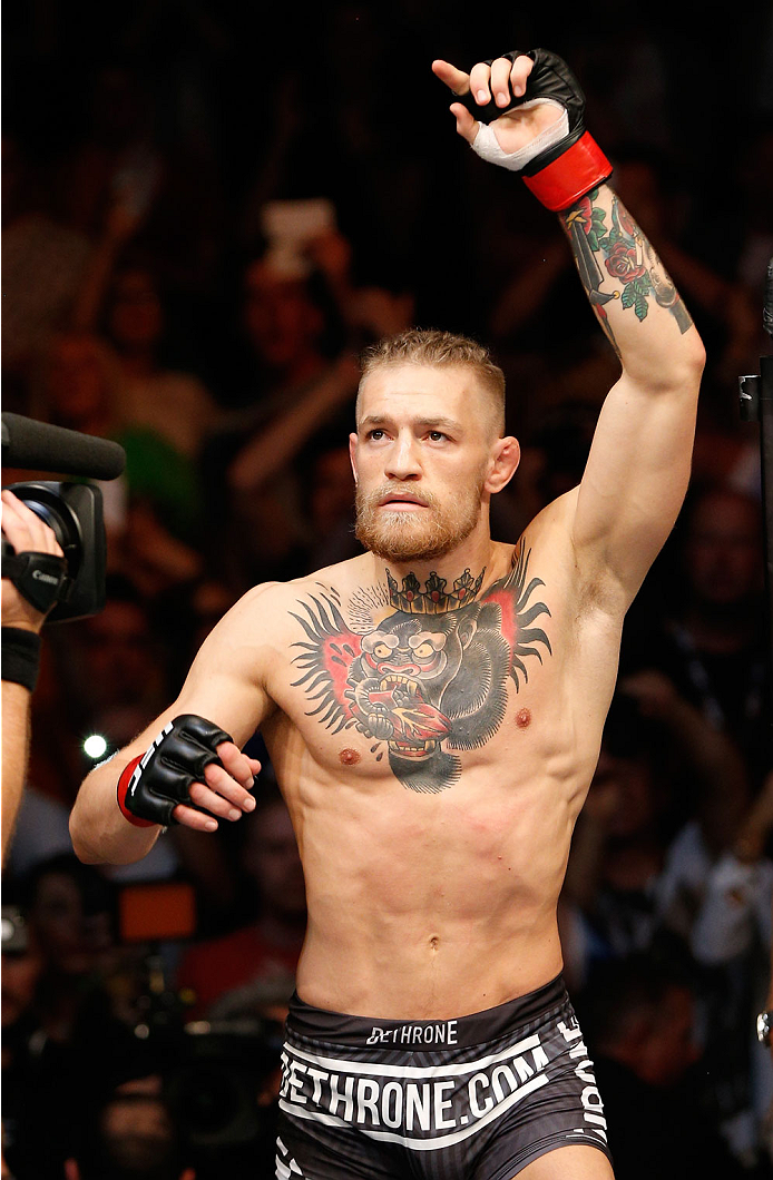 DUBLIN, IRELAND - JULY 19: Conor McGregor enters the Octagon before his featherweight bout against Diego Brandao during the UFC Fight Night event at The O2 Dublin on July 19, 2014 in Dublin, Ireland. (Photo by Josh Hedges/Zuffa LLC/Zuffa LLC via Getty I