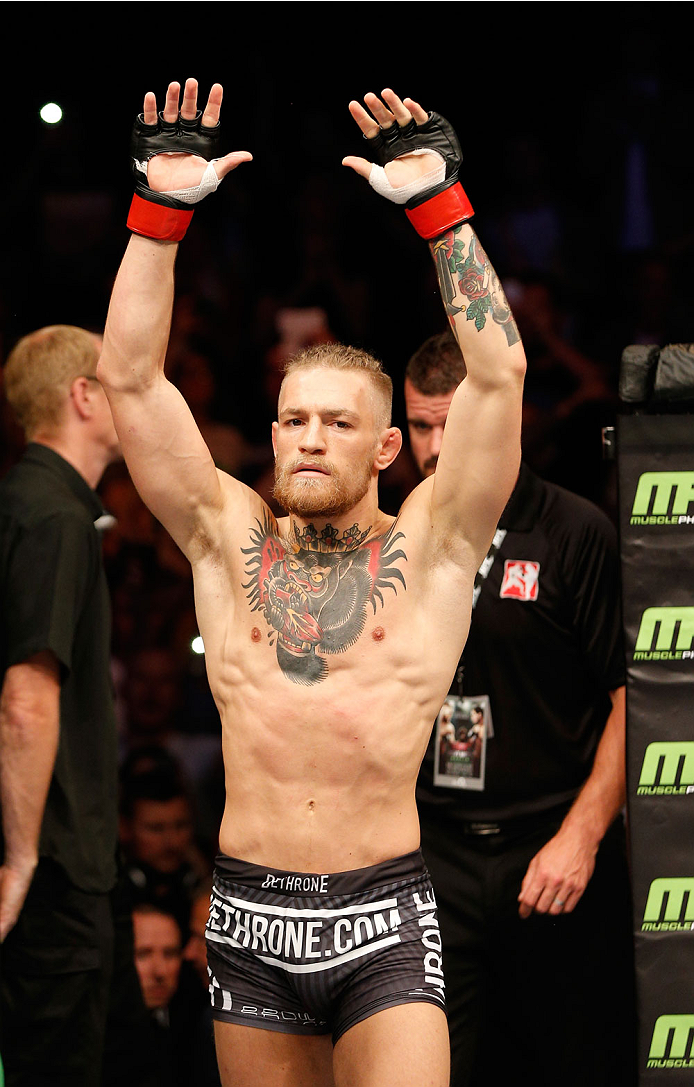 DUBLIN, IRELAND - JULY 19: Conor McGregor enters the Octagon before his featherweight bout against Diego Brandao during the UFC Fight Night event at The O2 Dublin on July 19, 2014 in Dublin, Ireland. (Photo by Josh Hedges/Zuffa LLC/Zuffa LLC via Getty I