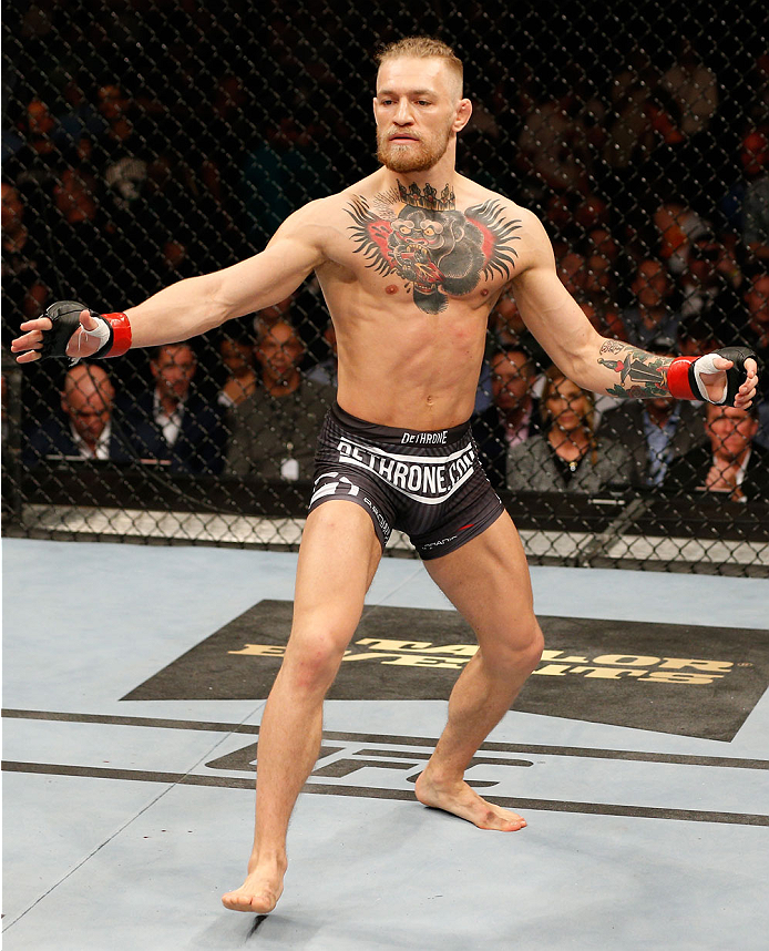 DUBLIN, IRELAND - JULY 19: Conor McGregor battles Diego Brandao (not pictured) in their featherweight bout against Diego Brandao during the UFC Fight Night event at The O2 Dublin on July 19, 2014 in Dublin, Ireland. (Photo by Josh Hedges/Zuffa LLC/Zuffa
