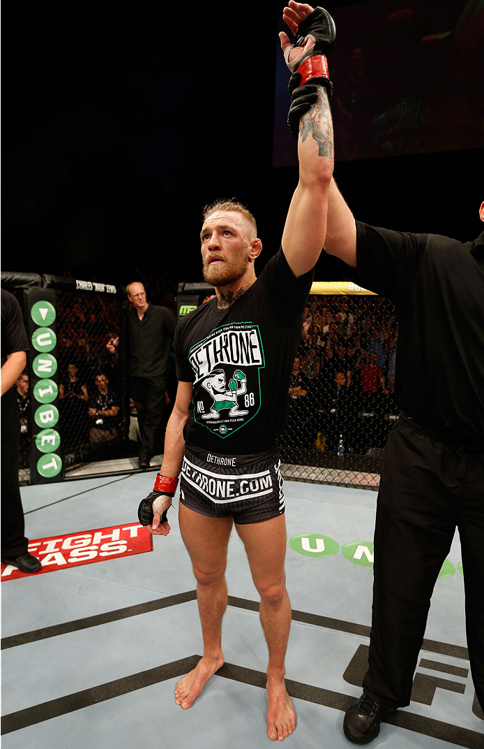 DUBLIN, IRELAND - JULY 19: Conor McGregor celebrates after his TKO victory over Diego Brandao in their featherweight bout during the UFC Fight Night event at The O2 Dublin on July 19, 2014 in Dublin, Ireland. (Photo by Josh Hedges/Zuffa LLC/Zuffa LLC vi