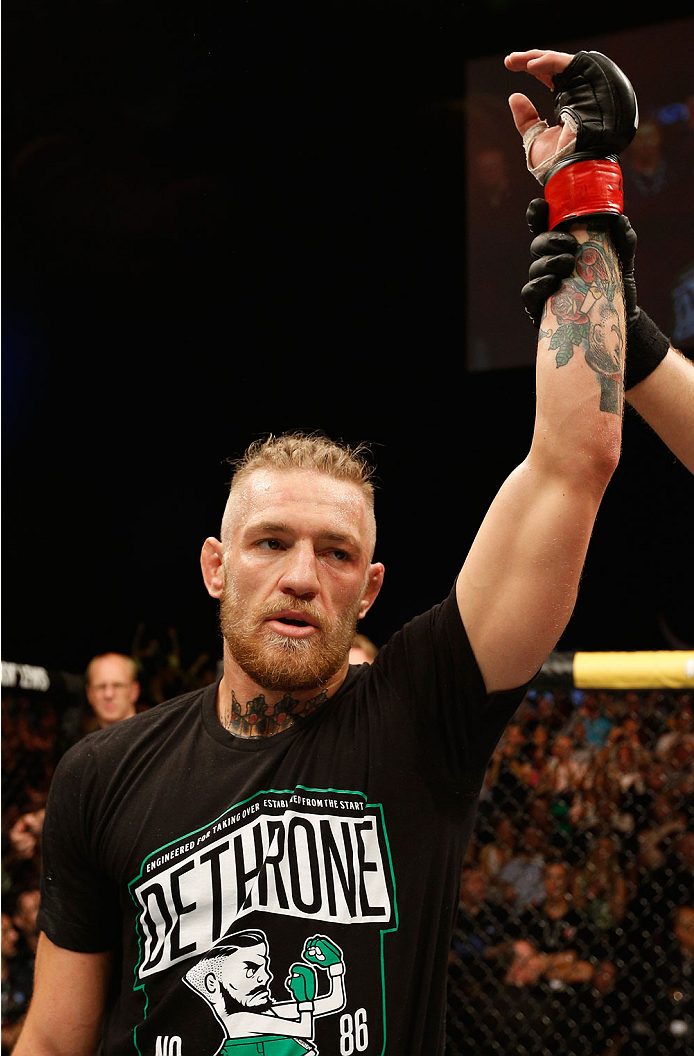 DUBLIN, IRELAND - JULY 19: Conor McGregor celebrates after his TKO victory over Diego Brandao in their featherweight bout during the UFC Fight Night event at The O2 Dublin on July 19, 2014 in Dublin, Ireland. (Photo by Josh Hedges/Zuffa LLC/Zuffa LLC vi