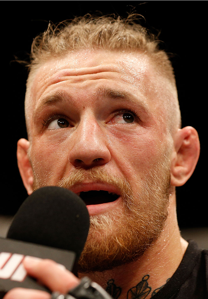 DUBLIN, IRELAND - JULY 19: Conor McGregor is interviewed after his TKO victory over Diego Brandao in their featherweight bout during the UFC Fight Night event at The O2 Dublin on July 19, 2014 in Dublin, Ireland. (Photo by Josh Hedges/Zuffa LLC/Zuffa LL