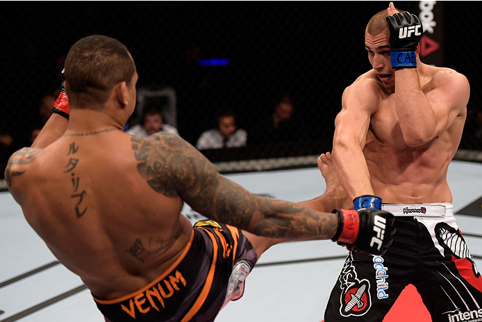 GOIANIA, BRAZIL - MAY 30: Luiz Dutra of Brazil kicks Tom Breese of England in their welterweight UFC bout during the UFC Fight Night Condit v Alves at Arena Goiania on May 30, 2015 in Goiania. (Photo by Buda Mendes/Zuffa LLC/Zuffa LLC via Getty Images)