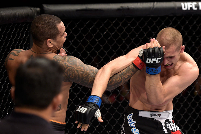 GOIANIA, BRAZIL - MAY 30: Luiz Dutra of Brazil punches Tom Breese of England in their welterweight UFC bout during the UFC Fight Night Condit v Alves at Arena Goiania on May 30, 2015 in Goiania. (Photo by Buda Mendes/Zuffa LLC/Zuffa LLC via Getty Images