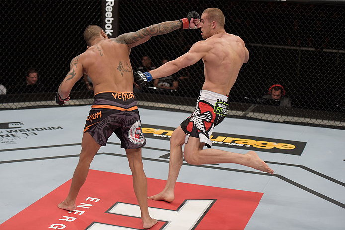 GOIANIA, BRAZIL - MAY 30: Luiz Dutra of Brazil and Tom Breese of England exchange punches in their welterweight UFC bout during the UFC Fight Night Condit v Alves at Arena Goiania on May 30, 2015 in Goiania. (Photo by Buda Mendes/Zuffa LLC/Zuffa LLC vi