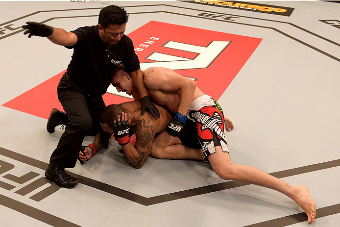 GOIANIA, BRAZIL - MAY 30: Tom Breese of punches Luiz Dutra of Brazil in their welterweight UFC bout during the UFC Fight Night Condit v Alves at Arena Goiania on May 30, 2015 in Goiania. (Photo by Buda Mendes/Zuffa LLC/Zuffa LLC via Getty Images)