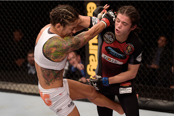 GOIANIA, BRAZIL - MAY 30: Juliana Lima of Brazil (L) and Ericka Almeida of Brazil exchange punches in their UFC strawweight bout during the UFC Fight Night Condit v Alves at Arena Goiania on May 30, 2015 in Goiania. (Photo by Buda Mendes/Zuffa LLC/Zuff