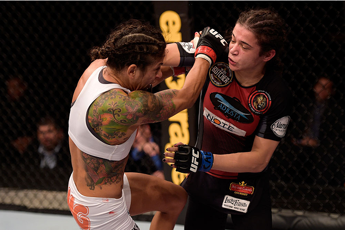 GOIANIA, BRAZIL - MAY 30: Juliana Lima of Brazil (L) and Ericka Almeida of Brazil exchange punches in their UFC strawweight bout during the UFC Fight Night Condit v Alves at Arena Goiania on May 30, 2015 in Goiania. (Photo by Buda Mendes/Zuffa LLC/Zuff