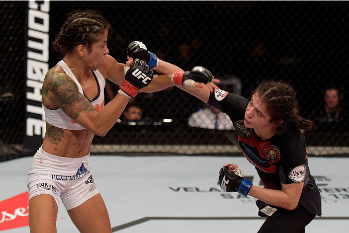 GOIANIA, BRAZIL - MAY 31: Ericka Almeida of Brazil punches Juliana Lima of Brazil in their UFC strawweight bout during the UFC Fight Night Condit v Alves at Arena Goiania on May 30, 2015 in Goiania. (Photo by Buda Mendes/Zuffa LLC/Zuffa LLC via Getty Im