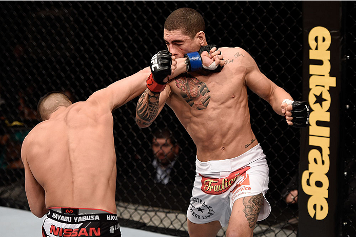 GOIANIA, BRAZIL - MAY 30: Mirsad Bektic of Bosnia punches Lucas Martins of Brazil in their featherweight UFC bout during the UFC Fight Night Condit v Alves at Arena Goiania on May 30, 2015 in Goiania. (Photo by Buda Mendes/Zuffa LLC/Zuffa LLC via Getty