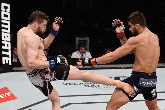 GOIANIA, BRAZIL - MAY 30: Nicolas Dalby of Denmark kicks Elizeu Zaleski dos Santos of Brazil in their welterweight UFC bout during the UFC Fight Night Condit v Alves at Arena Goiania on May 30, 2015 in Goiania. (Photo by Buda Mendes/Zuffa LLC/Zuffa LLC