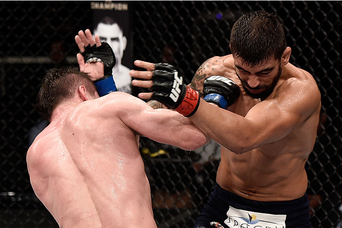 GOIANIA, BRAZIL - MAY 30: Nicolas Dalby of Denmark punches Elizeu Zaleski dos Santos of Brazil in their welterweight UFC bout during the UFC Fight Night Condit v Alves at Arena Goiania on May 30, 2015 in Goiania. (Photo by Buda Mendes/Zuffa LLC/Zuffa LL
