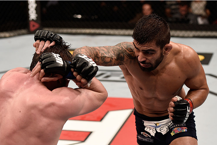 GOIANIA, BRAZIL - MAY 30: Elizeu Zaleski dos Santos of Brazil punches Nicolas Dalby of Denmark in their welterweight UFC bout during the UFC Fight Night Condit v Alves at Arena Goiania on May 30, 2015 in Goiania. (Photo by Buda Mendes/Zuffa LLC/Zuffa LL