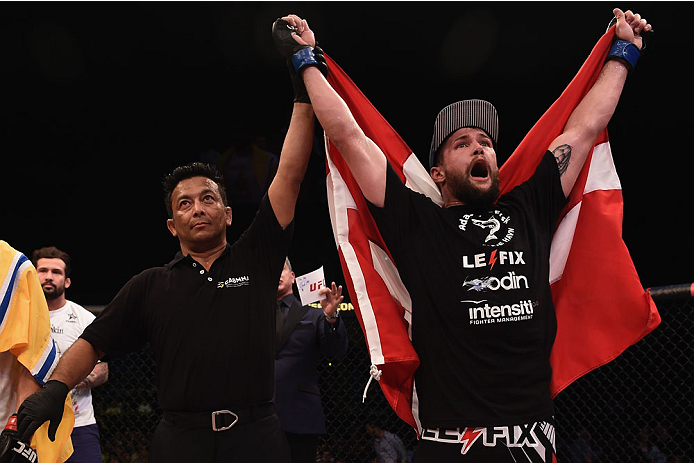 GOIANIA, BRAZIL - MAY 30: Nicolas Dalby of Denmark celebrates his victory over Elizeu Zaleski dos Santos of Brazil in their welterweight UFC bout during the UFC Fight Night Condit v Alves at Arena Goiania on May 30, 2015 in Goiania. (Photo by Buda Mende