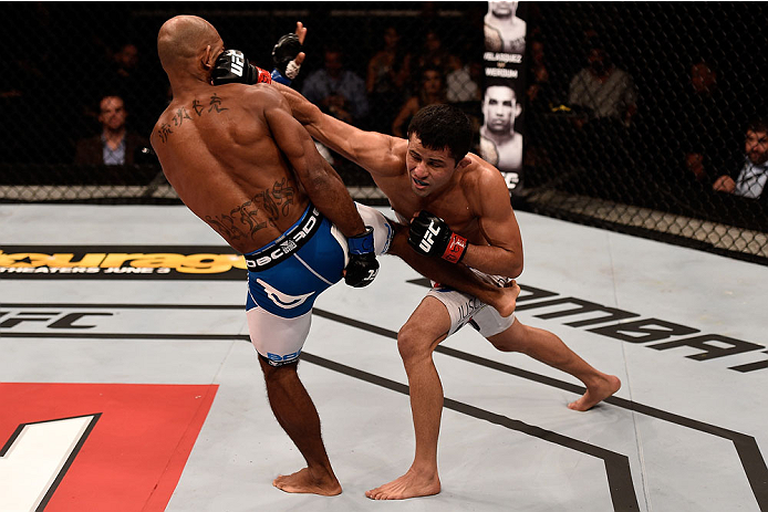 GOIANIA, BRAZIL - MAY 30: Jussier Formiga of Brazil punches Wilson Reis of Brazil in their UFC flyweight bout during the UFC Fight Night Condit v Alves at Arena Goiania on May 30, 2015 in Goiania. (Photo by Buda Mendes/Zuffa LLC/Zuffa LLC via Getty Imag