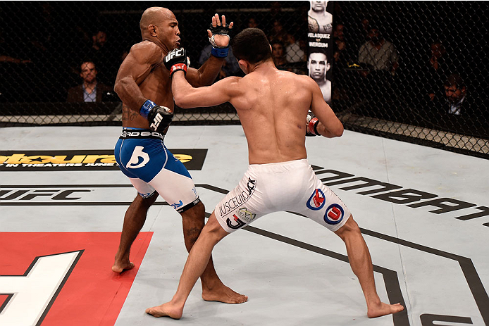 GOIANIA, BRAZIL - MAY 30: Jussier Formiga of Brazil punches Wilson Reis of Brazil in their UFC flyweight bout during the UFC Fight Night Condit v Alves at Arena Goiania on May 30, 2015 in Goiania. (Photo by Buda Mendes/Zuffa LLC/Zuffa LLC via Getty Imag
