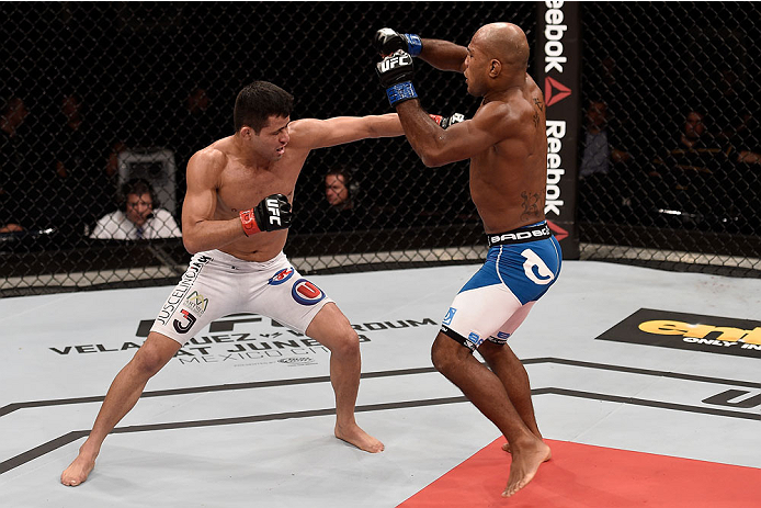 GOIANIA, BRAZIL - MAY 30: Jussier Formiga of Brazil punches Wilson Reis of Brazil in their UFC flyweight bout during the UFC Fight Night Condit v Alves at Arena Goiania on May 30, 2015 in Goiania. (Photo by Buda Mendes/Zuffa LLC/Zuffa LLC via Getty Imag