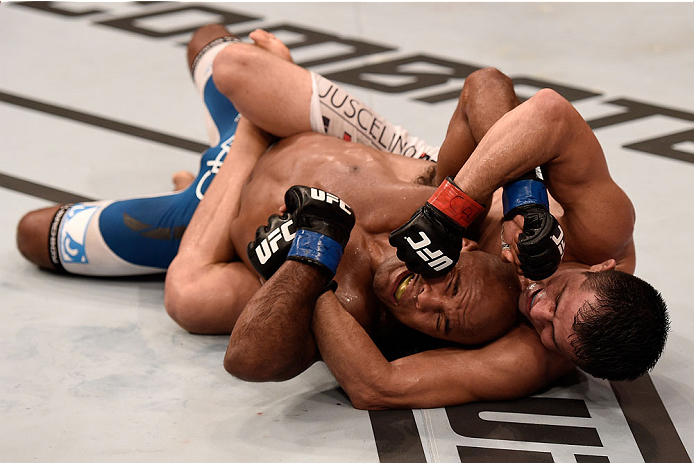 GOIANIA, BRAZIL - MAY 30: Wilson Reis of Brazil and Jussier Formiga of Brazil in their UFC flyweight bout during the UFC Fight Night Condit v Alves at Arena Goiania on May 30, 2015 in Goiania. (Photo by Buda Mendes/Zuffa LLC/Zuffa LLC via Getty Images)
