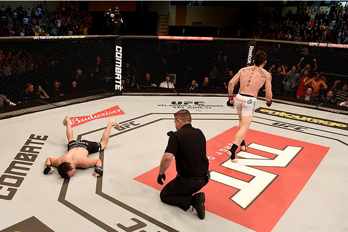GOIANIA, BRAZIL - MAY 30: Rony Jason of Brazil submits Damon Jackson of the United States in their UFC featherweight bout during the UFC Fight Night Condit v Alves at Arena Goiania on May 30, 2015 in Goiania. (Photo by Buda Mendes/Zuffa LLC/Zuffa LLC v