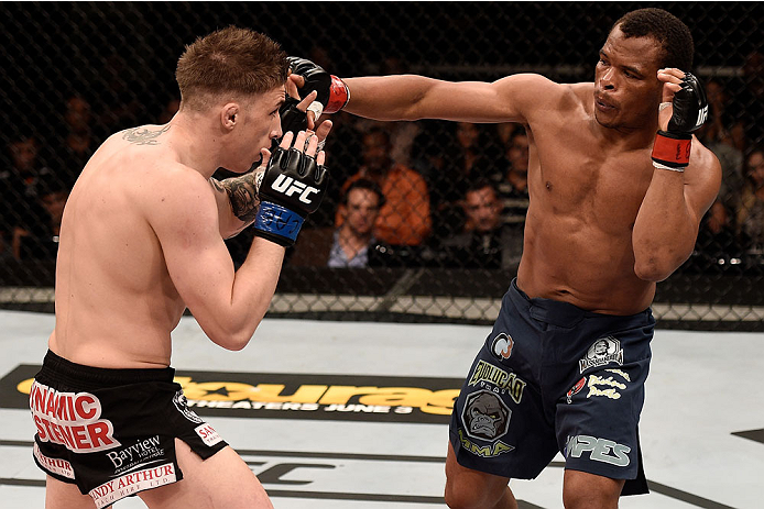 GOIANIA, BRAZIL - MAY 30: Francisco Trinaldo of Brazil punches Norman Parke of Northern Ireland in their lightweight UFC bout during the UFC Fight Night event at Arena Goiania on May 30, 2015 in Goiania. (Photo by Buda Mendes/Zuffa LLC/Zuffa LLC via Get