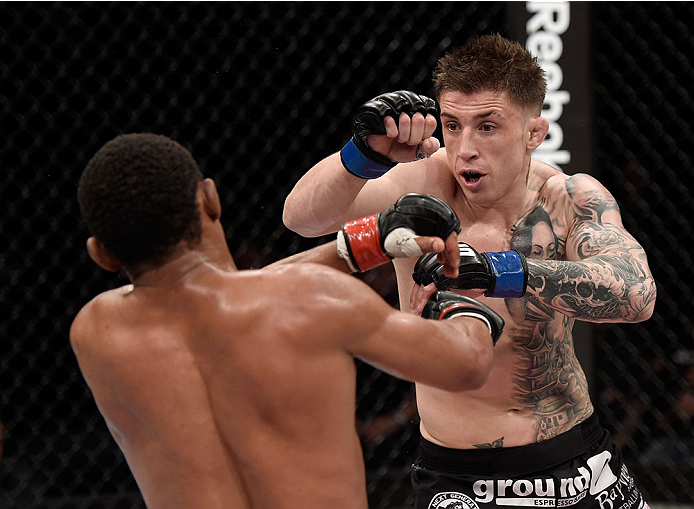 GOIANIA, BRAZIL - MAY 30: Francisco Trinaldo of Brazil punches Norman Parke of Northern Ireland in their lightweight UFC bout during the UFC Fight Night event at Arena Goiania on May 30, 2015 in Goiania. (Photo by Buda Mendes/Zuffa LLC/Zuffa LLC via Get